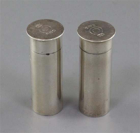 A pair of 1930s novelty silver condiments modelled as shotgun cartridges, by Mappin & Webb, 2.25in.
